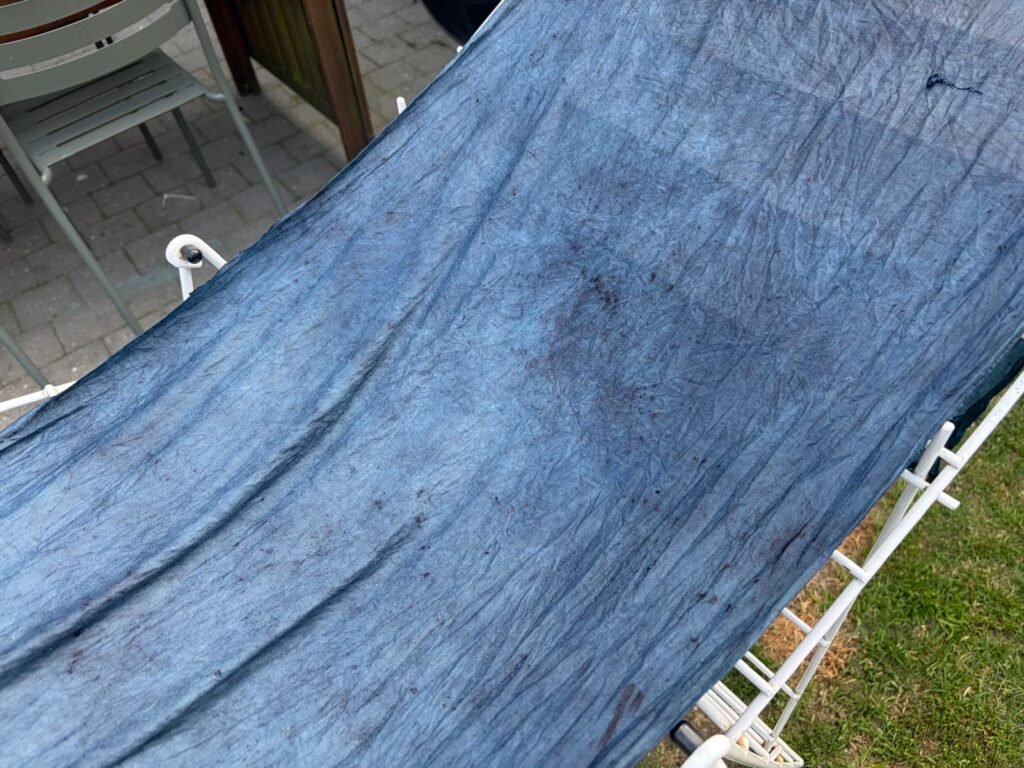 Blue satijn cotton after a natural indigo vat